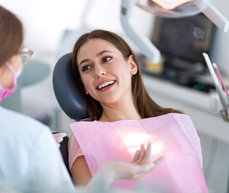 woman smiling in the dental chair